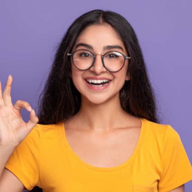 happy insian woman gesturing ok sign and smiling 92S8ZBS - DIB Technologies